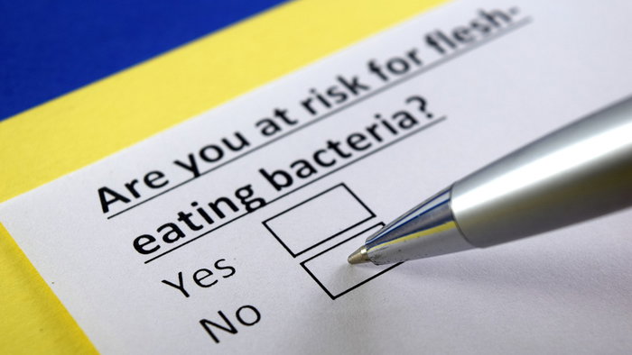 Illustration about the risk of infection from flesh eating bacteria linked to warm coastal waters.