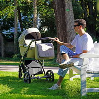 A man with a stroller.