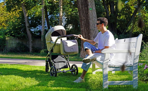 A man with a stroller.