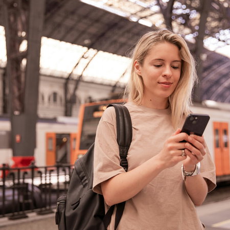 A young woman at a station.