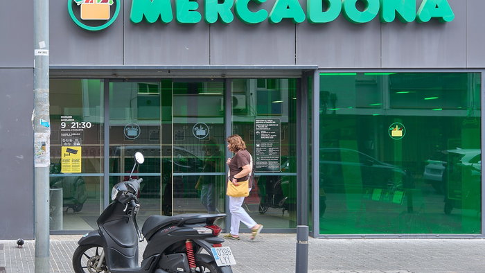 Mercadona supermarket entrance in Spain as the retailer prepares to extend opening hours and reopen selected stores on Sundays during the summer season.