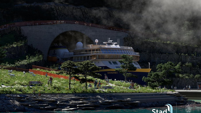 Ship emerges from the mountains.