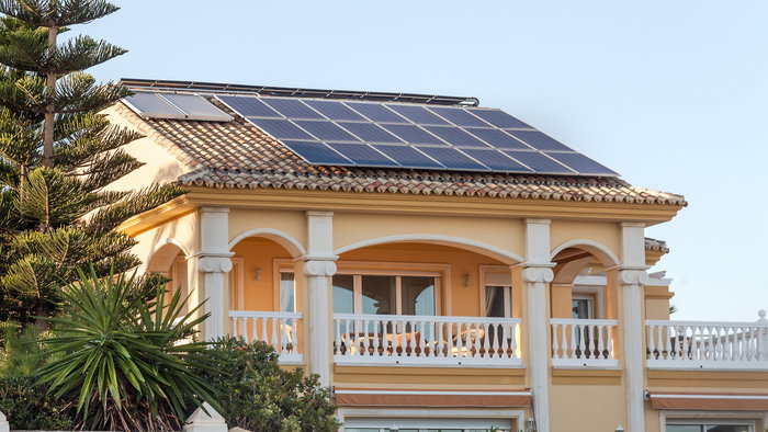Home with solar pannels.