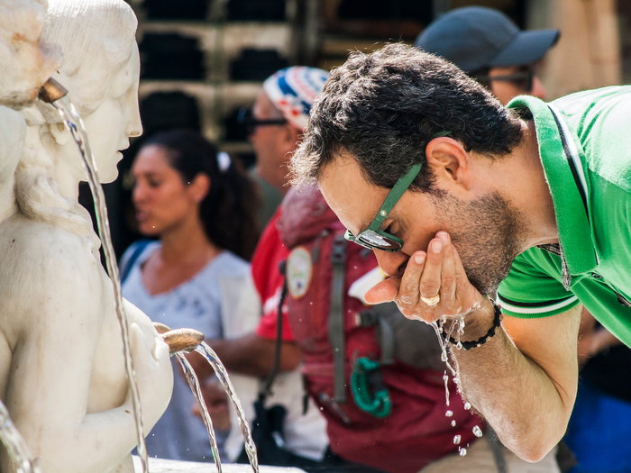 Keeping hydrated during the hottest hours.