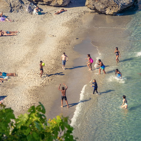Families on the beach in Nerja.