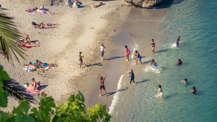 Families on the beach in Nerja.