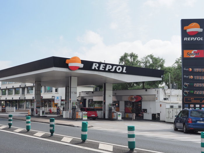A Repsol petrol station by the side of the road in Spain