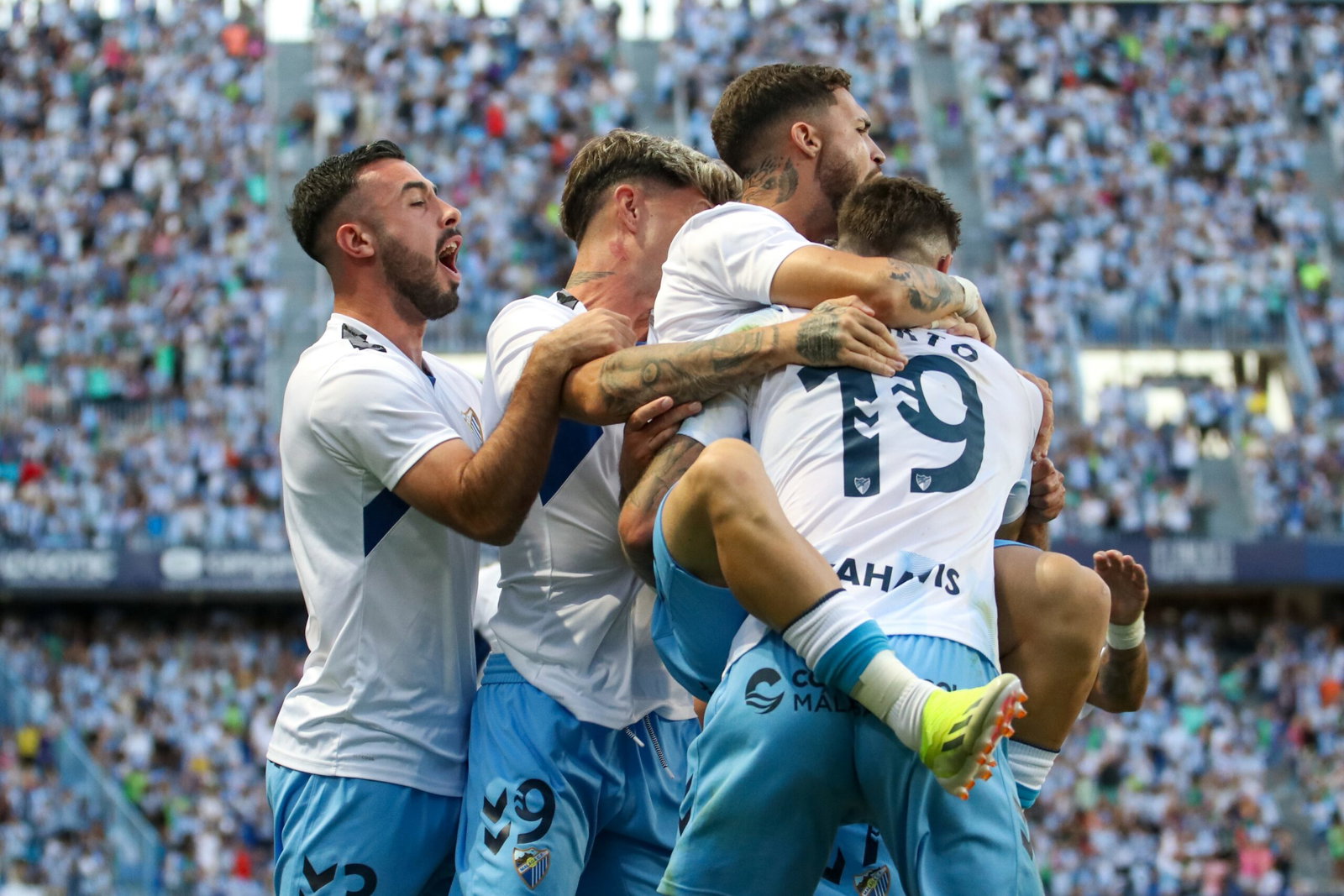 Málaga CF promoted to La Liga as 2–1 victory over Almería ends eight-year wait