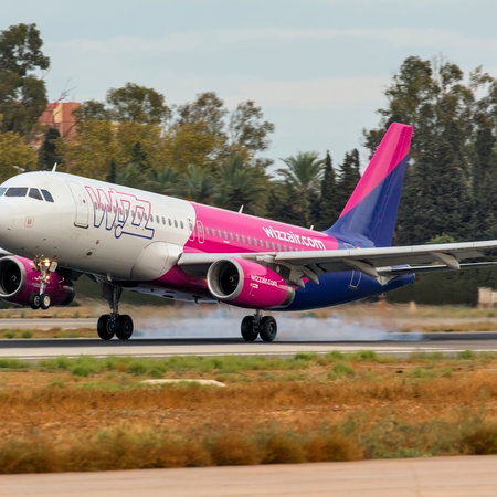 An aircraft lifting off from Malaga Airport