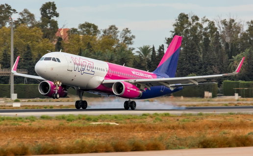 An aircraft lifting off from Malaga Airport