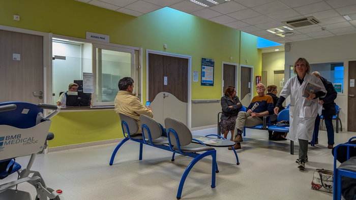 People waiting in a hospital waiting room