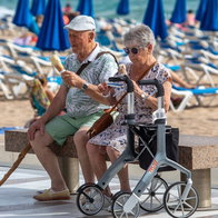 two eldery people eating ice cream in Benidorm