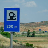 Fuel station road sign on the highway In Rural Spain
