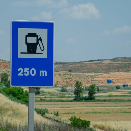 Fuel station road sign on the highway In Rural Spain