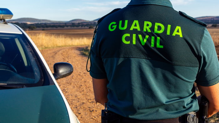 Guardia Civil focus on Spanish countryside.