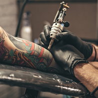 Close up of a man getting a tattoo