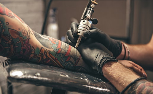 Close up of a man getting a tattoo