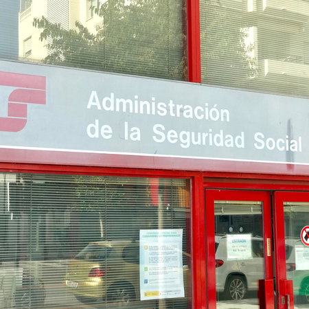 Entrance to a Spanish Social Security office, where new digital notification rules will replace paper letters for many workers from September.