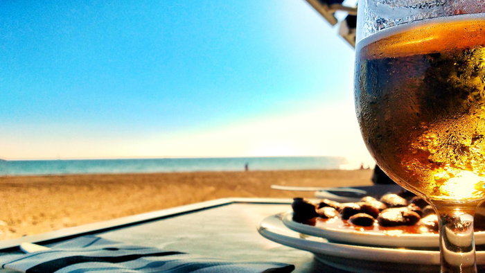 Spanish beach with beer and tapas