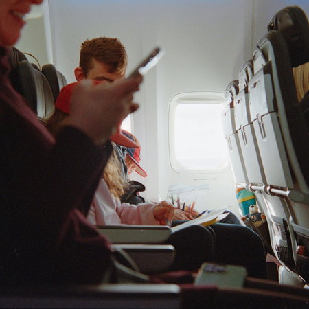 A family on a plane.