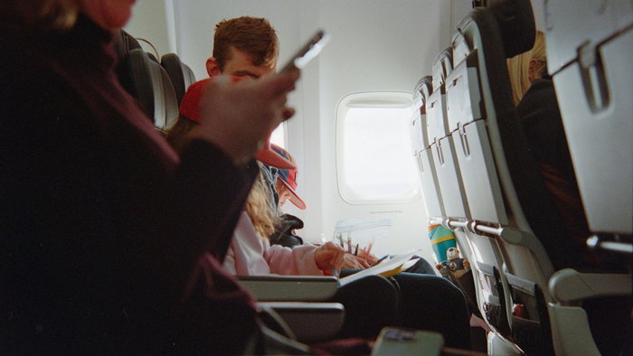A family on a plane.