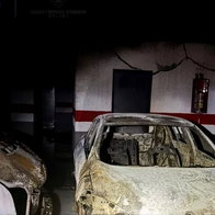 Two vehicles gutted by fire in Manilva car park.