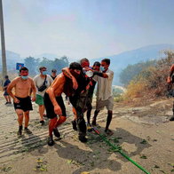Residents of Competa helping firefighters