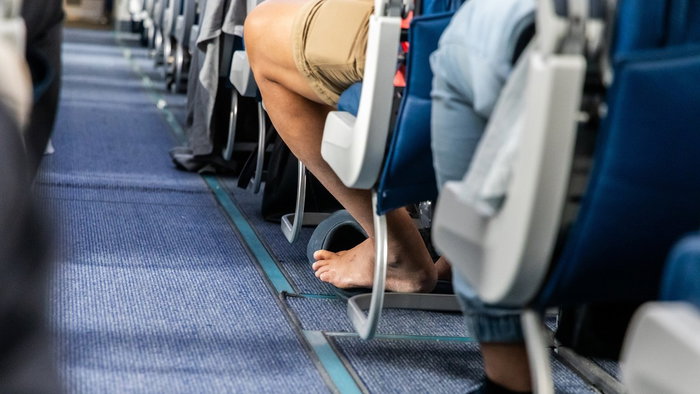 Bare feet on plane