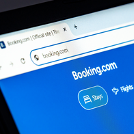 Laptop displaying the Booking.com website.