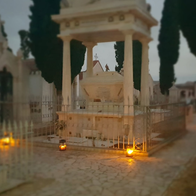 San Miguel cemetery in Cuevas del Almanzora at night under candlelight.