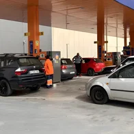 Queuing at a petrol station to fill up before the price hike.