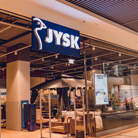 Blue-and-yellow JYSK furniture store in Spain.