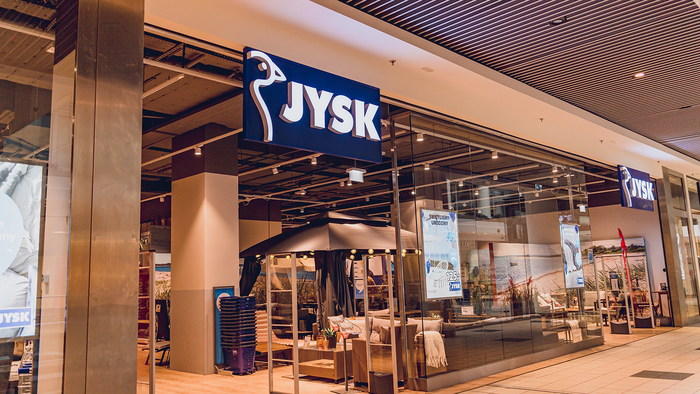 Blue-and-yellow JYSK furniture store in Spain.