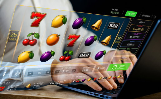 Man on a laptop playing online slot machines