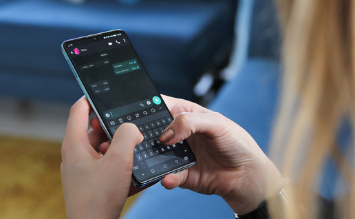 Person using whatsapp on their phone