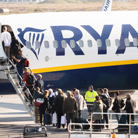 Passengers boarding a Ryanair flight.