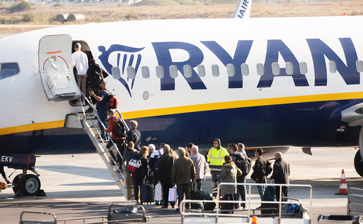 Passengers boarding a Ryanair flight.