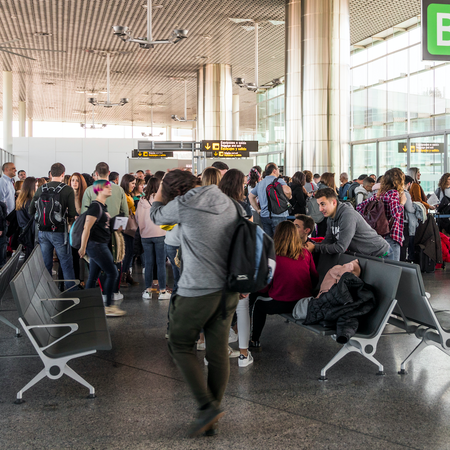 Busy airport gate at the Santiago International Airport