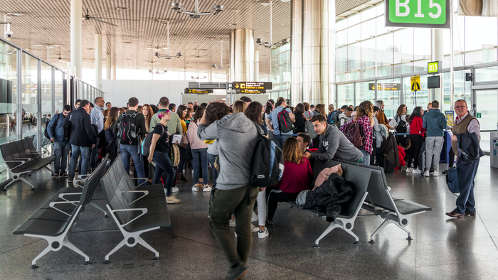 Busy airport gate at the Santiago International Airport