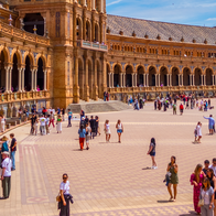 Tourists walking through the Plaza España in Sevilla