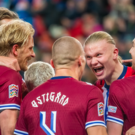 Norwegian player Erlin Haaland hugging his team mates