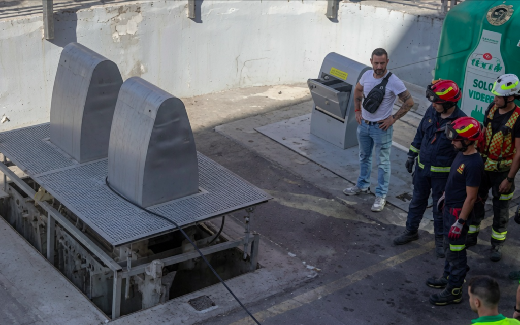 Search for missing neighbour ends with bizarre underground rubbish bin rescue