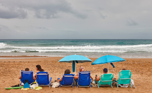 Beach goers at a beach in Murcia
