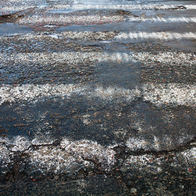 Worn down and unpainted zebra crossing