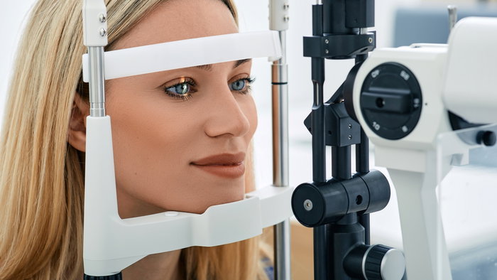 Blonde Woman having an eye test