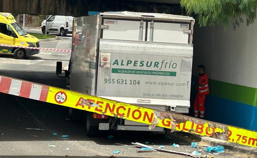 Van stuck in underpass