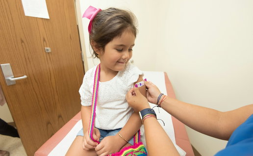A child receiving a vaccine.