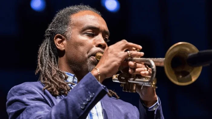 A trumpet player.