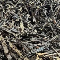 A large pile of weapons found in a warehouse