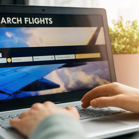 Flight search on a laptop